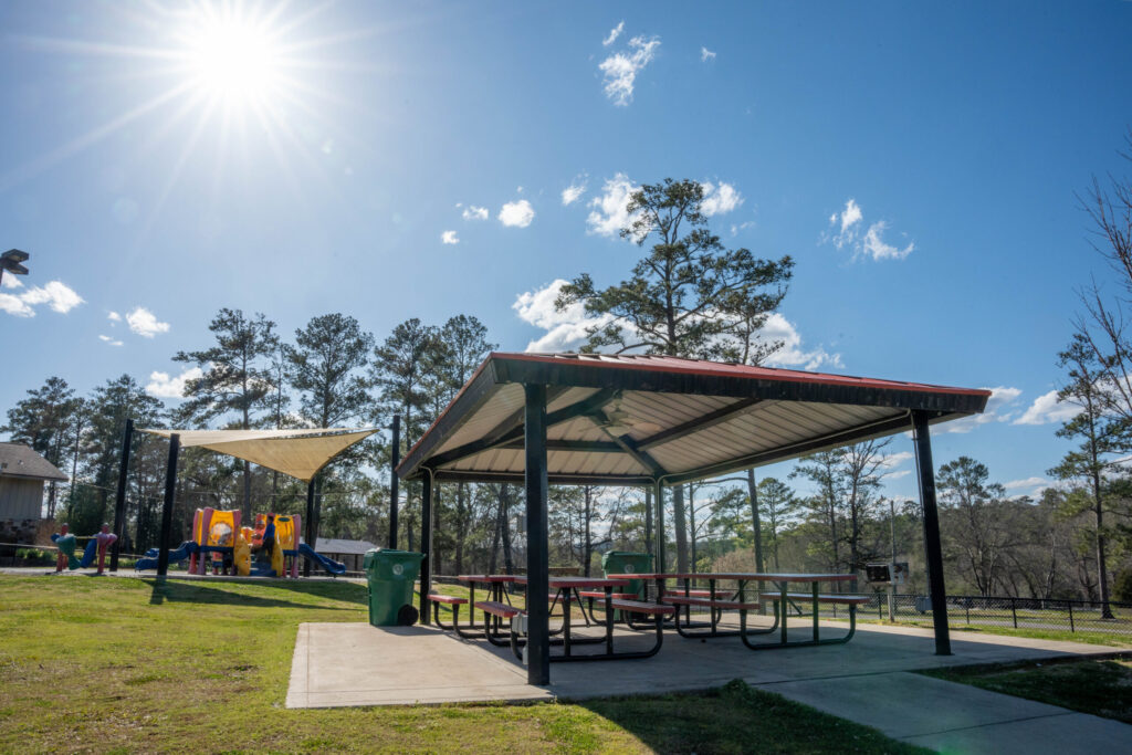 a house with trees in the background