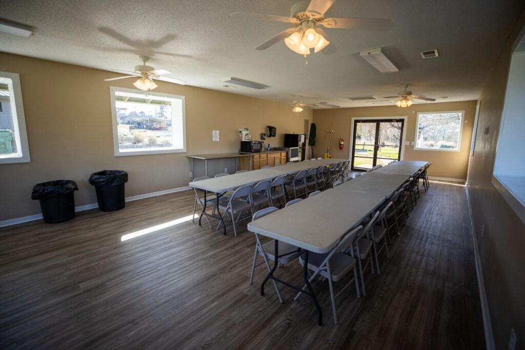 a room filled with furniture and a wood floor