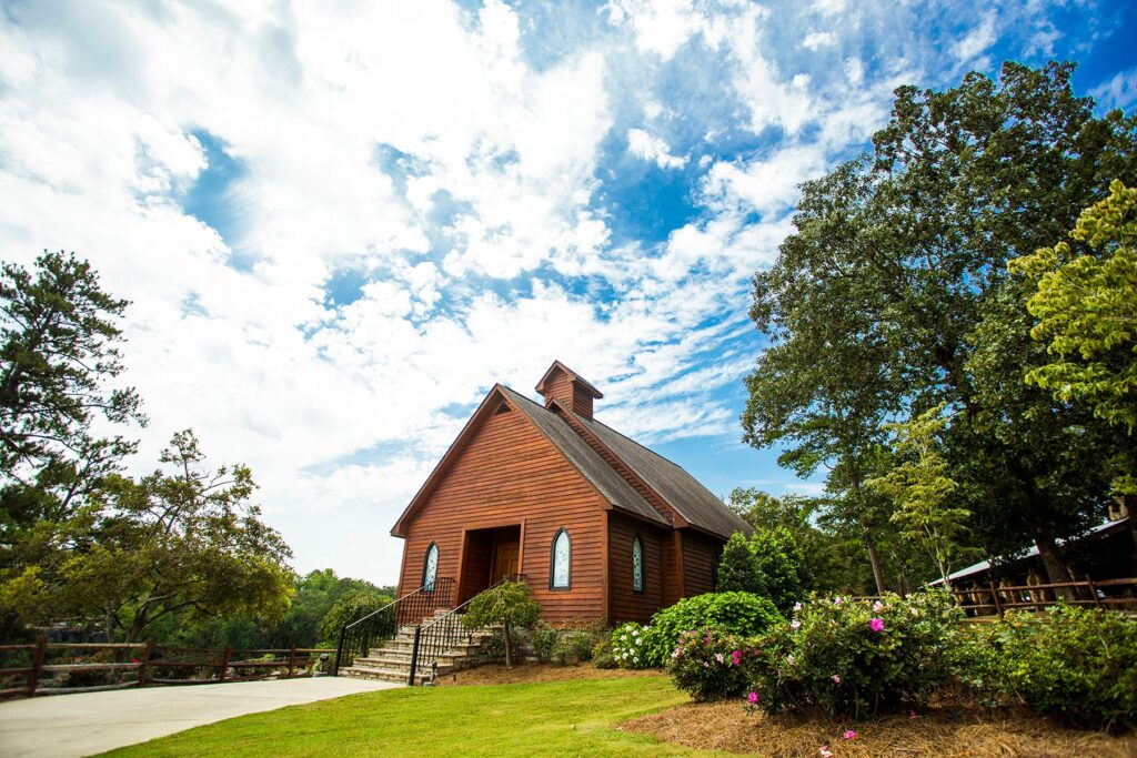 a house with trees in the background